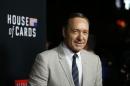 Cast member Spacey poses at the premiere for the second season of the television series "House of Cards" at the Directors Guild of America in Los Angeles