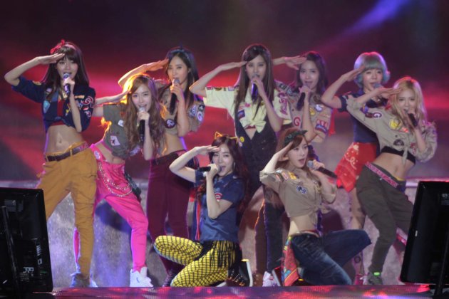 Kpop group "Girls Generation" performs for the crowd during the "Dream Kpop Fantasy Concert" held at the Mall of Asia grounds in Pasay city, south of Manila on 19 January 2013.