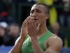 Ashton Eaton reacts after the 1500m during the decathlon competition at the U.S. Olympic Track and Field Trials Saturday, June 23, 2012, in Eugene, Ore. Eaton finished the decathlon with a new world record. (AP Photo/Matt Slocum)