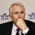 IATA director general Tony Tyler listens to a question at a news conference in Beijing