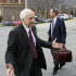 Jerry Sandusky, left, a former Penn State assistant football coach charged with sexually abusing boys, departs with his attorney Joe Amendola, from the Centre County Courthouse after a bail conditions hearing Friday, Feb. 10, 2012 in Bellefonte, Pa. (AP Photo/Alex Brandon)