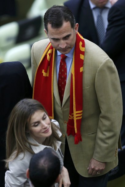 Spain's Crown Prince Felipe and Princess Letizia prepare to leave after Group C Euro 2012 soccer match between Spain and Italy in Gdansk