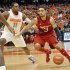Louisville's Peyton Silva, right, drives against Syracuse's Scoop Jardine during the first half of an NCAA college basketball game in Syracuse, N.Y., Saturday, March 3, 2012. (AP Photo/KevinRivoli)