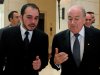FILE - In this March 23, 2010 file photo, FIFA President Sepp Blatter, right, speaks with Jordan's Prince Ali, chairman of the Jordan Football Association, in Amman, Jordan. FIFA Vice President Prince Ali will urge football's rulemakers on Saturday, March 3, 2012 to overturn a ban on Islamic female players wearing hijabs, insisting they are not religious garments. (AP Photo/Mohammad Abu Ghosh, File)