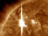 This handout image provided by NASA shows a solar flare heading toward Earth. An impressive solar flare is heading toward Earth and could disrupt power grids, GPS and airplane flights. An impressive solar flare is heading toward Earth and could disrupt power grids, GPS and airplane flights. Forecasters at the National Oceanic and Atmospheric Administration's (NOAA) Space Weather Prediction Center said the sun erupted Tuesday evening and the effects should start smacking Earth late Wednesday night, close to midnight EST. They say it is the biggest in five years and growing. (AP Photo/NASA)