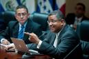 Former Salvadorean president Francisco Flores (R) answers questions to the congress in San Salvador on January 7, 2014, during a special commission investigation on the disappearance of a $10 million donation made by the Taiwanese government