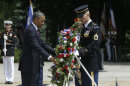 President Barack Obama participates in the wreath-laying ceremony at the Tomb of the Unknowns at Arlington National Cemetery on Memorial Day, May 27, 2013, in Arlington, Va. (AP Photo/Pablo Martinez Monsivais)