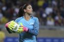FILE - In this Aug. 3, 2016, file photo, U.S. goalkeeper Hope Solo takes the ball during a women's Olympic football tournament match against New Zealand in Belo Horizonte, Brazil. Solo has been suspended form the team for six months for what U.S. Soccer termed conduct "counter to the organization's principles." The suspension is effective immediately. U.S. Soccer President Sunil Gulati said Wednesday, Aug. 24, that comments Solo made after the U.S. lost to Sweden during the Rio Olympics were "unacceptable and do not meet the standard of conduct we require from our National Team players." (AP Photo/Eugenio Savio, File)