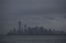 The skyline of lower Manhattan sits in darkness after a preventive power outage caused by Hurricane Sandy in New York