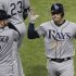 Tampa Bay Rays' Evan Longoria, right, celebrates with Jeff Keppinger after hitting a solo home run against the Chicago White Sox during the ninth inning of a baseball game in Chicago, Thursday, Sept. 27, 2012. The Rays won 3-2. (AP Photo/Nam Y. Huh)