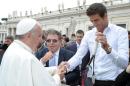 This handout picture released by the Vatican press office on May 16, 2013 shows Pope Francis (L) greeting Argentinian tennis player Juan Martin del Potro on St Peter's square at the Vatican