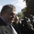Greek Finance Minister Evangelos Venizelos leaves Maximou mansion after a meeting with Charles Dallara and Jean Lemiere from the Institute of International Finance, which represents Greece's private bondholders and  Greek Prime Lukas Papademos, Athens, Friday, Jan. 20, 2012. (AP Photo/Dimitri Messinis)