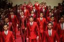 Models wear creations for Dolce & Gabbana men's Spring-Summer 2015 collection, part of the Milan Fashion Week, unveiled in Milan, Italy, Saturday, June 21, 2014. (AP Photo/Luca Bruno)