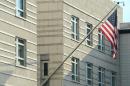 The US national flag is displayed outside the building of the US embassy in Berlin, on July 10, 2014