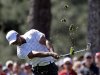 Tiger Woods hits off the first fairway during the third round of the Masters golf tournament Saturday, April 7, 2012, in Augusta, Ga. (AP Photo/Darron Cummings)