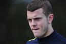 Arsenal's English midfielder Jack Wilshere looks on during training at Arsenal's training ground, London Colney, North London, England on February 18, 2013