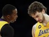 Los Angeles Lakers' Dwight Howard, left, talks to Pau Gasol, of Spain, during the first half of an NBA basketball game against the Houston Rockets in Los Angeles, Wednesday, April 17, 2013. (AP Photo/Jae C. Hong)