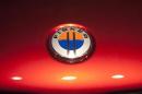 The Fisker automotive electric Atlantic sedan logo is seen during its unveiling ahead of the 2012 International Auto Show in New York