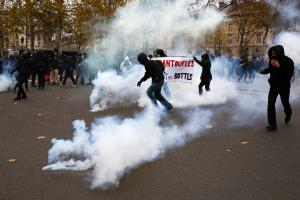 Protestors clash with riot police during a rally against &hellip;