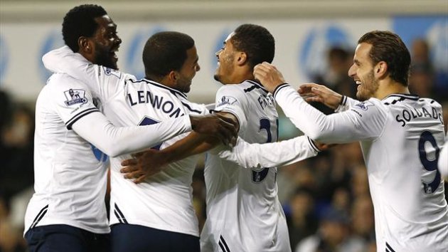 Tottenham Hotspur's Aaron Lennon (2nd L) celebrates his goal against Stoke City with Zeki Fryers (2nd R), Roberto Soldado (R) and Emmanuel Adebayor (L) (Reuters)