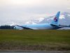 A Korean Air Boeing 777 is parked on the runway of a Canadian Forces base in Comox, British Columbia after an emergency landing on Tuesday April 10, 2012. The plane, en route from Vancouver, British Columbia to Seoul, diverted to Comox on Vancouver Island under escort by two U.S. fighter jets after the airline's U.S. call center received a call about a threat on board. (AP Photo/The Canadian Press, Richard Warrington)