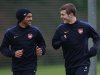 Arsenal's Theo Walcott and Jack Wilshere attend a team training session in London Colney