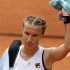 Kuznetsova of Russia leaves the court after losing her match against Errani of Italy during the French Open tennis tournament at the Roland Garros stadium in Paris