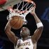 Los Angeles Lakers guard Jodie Meeks (20) dunks against the Sacramento Kings in the first half of an NBA basketball game in Los Angeles, Sunday, March 17, 2013. (AP Photo/Reed Saxon)