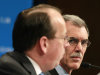 In this photo taken March 9, 2012, Solicitor General Donald B. Verrilli Jr., right, and Paul Clement, who are to argue the constitutionality of the Patient Protection and Affordable Care Act before the Supreme Court, take part in a Georgetown University Law Center forum in Washington. Verrilli said during the Supreme Court arguments on the law that the court "has a solemn obligation to respect the judgments of the democratically accountable branches of government."(AP Photo/Haraz N. Ghanbari)