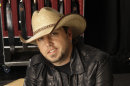 FILE - In this March 3, 2009 file photo, country music performer Jason Aldean poses for a photo in Nashville, Tenn. Aldean has the second most ACM nominations behind Kenny Chesney, with six, including entertainer and album of the year. (AP Photo/Mark Humphrey, File)