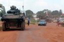 French Sangaris troops patrol in a military vehicle on August 16, 2014 in Bangui, CAR