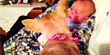 Dog helps cover baby with blanket (Y! Screen/Purina)