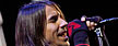Anthony Kiedis of the Red Hot Chili Peppers performs Tuesday night, Oct. 17, 2006 at Continental Airlines Arena in East Rutherford, N.J. (AP Photo/Bill Kostroun)