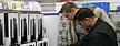 Shoppers check out the Sony Playstation 3 game console. (Sean Gallup/Getty Images)