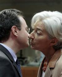 French Finance Minister Christine Lagarde, right, greets Greek Finance Minister George Papaconstantinou during an emergency meeting of EU finance ministers in Brussels, Sunday, May 9, 2010. EU finance ministers meet in Brussels Sunday to discuss establishing a new 