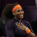 Serena Williams of the U.S. reacts after winning against Czech Republic's Petra Kvitova in their WTA Qatar Ladies Open tennis quarterfinal match in Doha, Qatar, Friday, Feb. 15, 2013. (AP Photo/Osama Faisal)