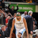 DENVER, CO - APRIL 10: Corey Brewer #13 of the Denver Nuggets celebrates after making a three-pointer against the San Antonio Spurs on April 10, 2013 at the Pepsi Center in Denver, Colorado. (Photo by Garrett W. Ellwood/NBAE via Getty Images)