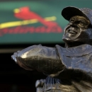 A statue of former St. Louis Cardinals baseball player Stan Musial stands outside Busch Stadium Sunday, Jan. 20, 2013, in St. Louis. Musial, one of baseball's greatest hitters and a Hall of Famer with the Cardinals for more than two decades, died Saturday, Jan. 19, 2013, the team announced. He was 92. (AP Photo/Jeff Roberson)