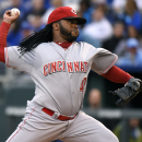 Cincinnati Reds starting pitcher Johnny Cueto throws in the first inning during an interleague baseball game against the Kansas City Royals Tuesday, May 19, 2015, in Kansas City, Mo. (AP Photo/Ed Zurga)