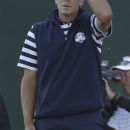 USA's Steve Stricker reacts after a putt on the 18th hole during a singles match at the Ryder Cup PGA golf tournament Sunday, Sept. 30, 2012, at the Medinah Country Club in Medinah, Ill. (AP Photo/David J. Phillip)