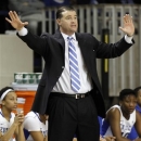 Kentucky head coach Matthew Mitchell directs his team during the first half of an NCAA women's college basketball game against Marist at Memorial Coliseum in Lexington, Ky., Sunday, Dec. 30, 2012. (AP Photo/James Crisp)
