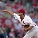 St. Louis Cardinals starting pitcher Adam Wainwright throws during the first inning of a baseball game against the San Diego Padres on Tuesday, May 22, 2012, in St. Louis. (AP Photo/Jeff Roberson)