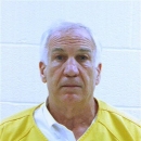 FILE - This file booking photo provided by the Centre County Correctional Facility in Bellefonte, Pa., shows former Penn State University assistant football coach Jerry Sandusky. Sandusky will be sentenced Tuesday, Oct. 9, 2012 for sexually abusing 10 boys in a scandal that rocked the university and brought down coach Joe Paterno. Because of who he is and what he's done, Sandusky could be in particular danger of sexual assault when he is sent off to prison this week. (AP Photo/Centre County Correctional Facility, File)