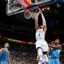 OKLAHOMA CITY, OK - FEBRUARY 27: Russell Westbrook #0 of the Oklahoma City Thunder dunks against Al-Farouq Aminu #0 of the New Orleans Hornets on February 27, 2013 at the Chesapeake Energy Arena in Oklahoma City, Oklahoma. (Photo by Layne Murdoch/NBAE via Getty Images)