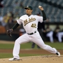 Oakland Athletics' Tommy Milone works against the Houston Astros in the first inning of a baseball game, Monday, April 15, 2013, in Oakland, Calif. (AP Photo/Ben Margot)