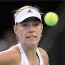 Germany's Angelique Kerber watches the ball during her Fed Cup World Group first round tennis match against Australia's Samantha Stosur in Stuttgart, Germany, Sunday Feb. 8, 2015. (AP Photo/dpa, Bernd Weissbrod)