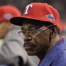 Texas Rangers manager Ron Washington (38) watches from the dugout in the eighth inning against the Baltimore Orioles in the American League wild-card playoff baseball game Friday, Oct. 5, 2012 in Arlington, Texas. (AP Photo/Tony Gutierrez)