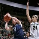 Penn State's Maggie Lucas (33) shoots against Michigan State's Klarissa Bell (21) during the first half of an NCAA college basketball game on Sunday, Jan. 6, 2013, in East Lansing, Mich. (AP Photo/Al Goldis)