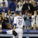 Los Angeles Dodgers starting pitcher Zack Greinke comes out of the game against the Washington Nationals in the sixth inning of a baseball game in Los Angeles Wednesday, May 15, 2013. (AP Photo/Reed Saxon)