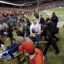 Houston Texans head coach Gary Kubiak is taken off the field on a stretcher during the second quarter of an NFL football game against the Indianapolis Colts, Sunday, Nov. 3, 2013, in Houston. (AP Photo/David J. Phillip)